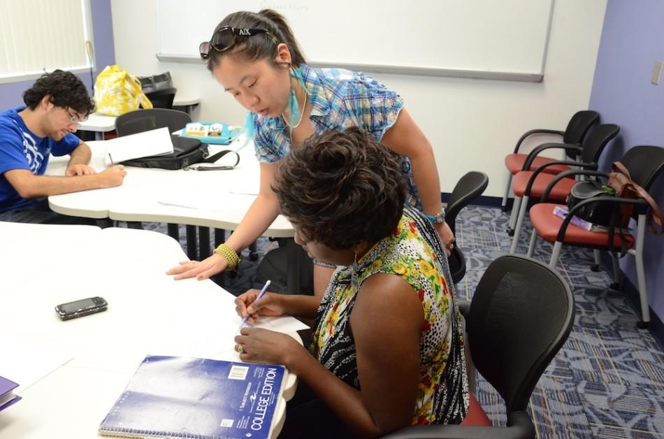 Supplemental instructors like graduate student Ning Ovathanasin help tutor undergrads in tough classes. Students asked SG to fund more SI leaders, which they did in March. Photo by Christine Capozziello