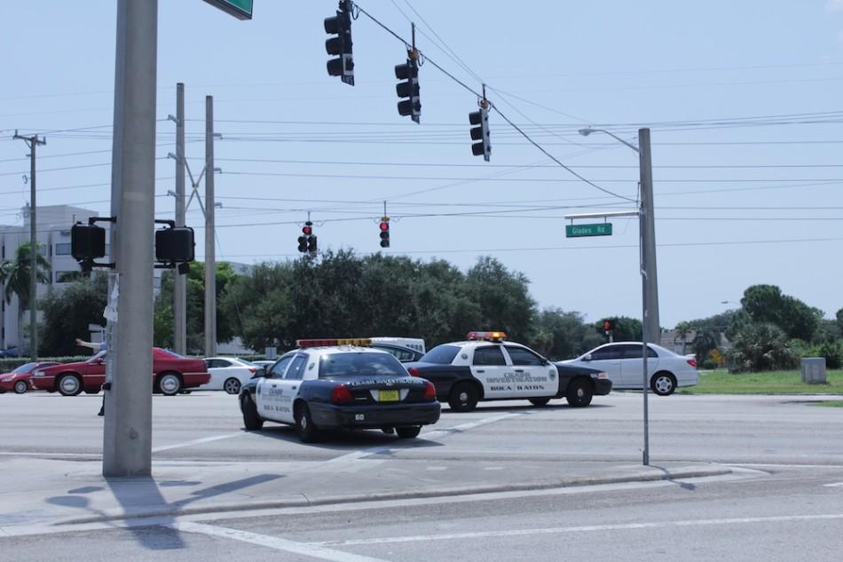 Boca Raton Police closed Glades Road following an accident involving a cyclist. They re-opened the road after a few hours. Photo by Allison Nielson.